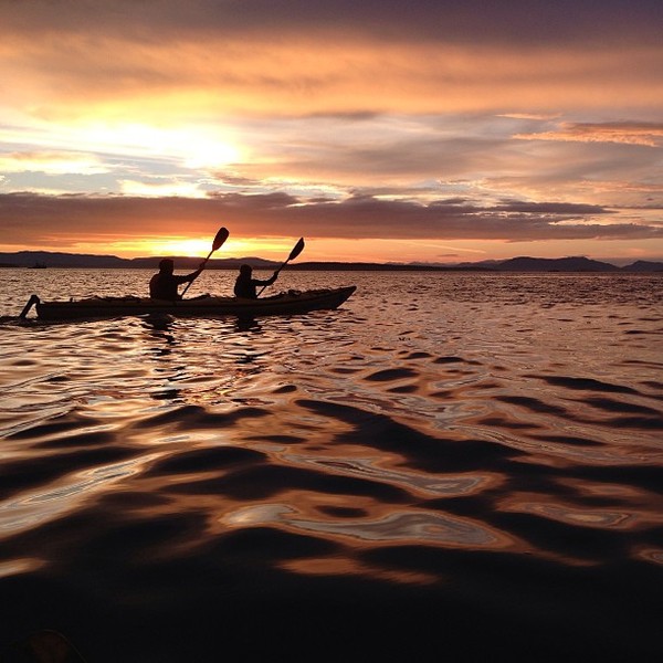 Sea Kayaking on the west side of San Juan Island in the sunset..