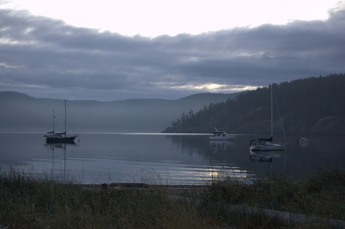 Sailboats and powerboats at anchor at Spencer spit State Park, Lopez Island.